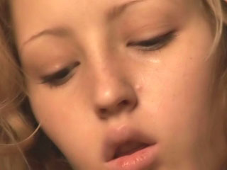 Adorable flaxen-haired teen marauding and fingering wet pussy